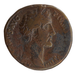 Sestertius of Antoninus Pius (86–161; Roman emperor 138–161). Obverse: head of the emperor in a
