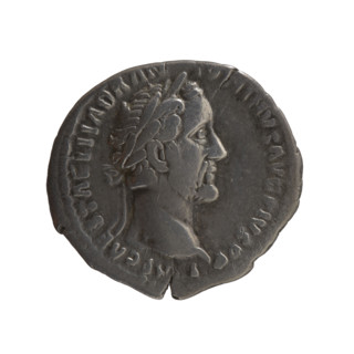 Denarius of Antoninus Pius (86–161; Roman emperor 138–161). Obverse: Head of the emperor in a