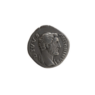 Denarius, after 161 CE. Obverse: Head of Antoninus Pius without a covering, with drapery on the