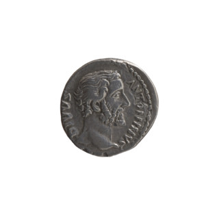 Denarius, after 161 CE. Obverse: head of Antoninus Pius without a cap to the right, inscription
