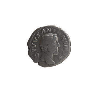 Denarius, after 161 CE. Obverse: Head of Antoninus Pius without a covering facing right,