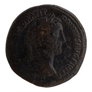 Sestertius of Antoninus Pius (86–161; Roman emperor 138–161). Obverse: Head of Antoninus Pius in a
