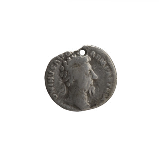 Denarius (with a hole), Marcus Aurelius (121–180; Roman emperor 161–180), issuer. Obverse: Head of