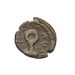 Bronze coin of Vologases V (191–208). Obverse: head of Vologases V facing left wearing a tiara and