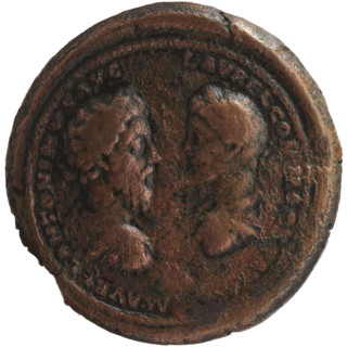 Bronze medallion, 177–180 CE. Obverse: two busts facing each other—left Marcus Aurelius, right