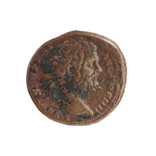 Head of Septimius Severus in a laurel wreath facing right, inscribed 'L SEPT SEV PERT - AVG IMP