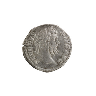 Denarius depicting standing emperor and tripod iconography; Septimius Severus (Roman emperor,