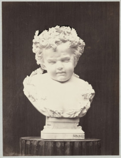 Photograph of the sculpture 'Weeping Putto' by Wiktor Brodzki; sculptor Wiktor Polearch Brodzki