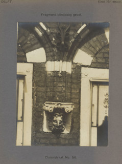 Corb stone decorated with a head in the facade of a building in the Choorstraat in Delft,