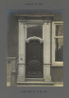 Oude Delft WZ No. 125. Louis XIV door, Door of a building on the Oude Delft in Delft, photograph,