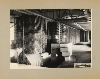 Factory hall with racks, album page, photograph, Album page with a photo in a factory hall with