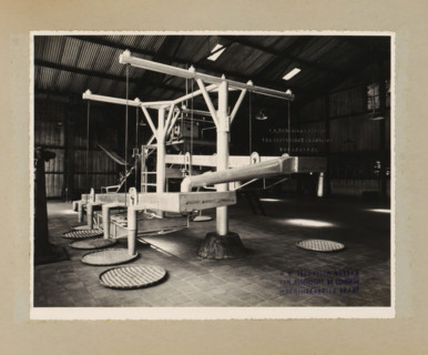 Installation, album page, photograph, Album page with a photo of an installation with conveyor