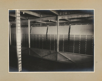Installation, photograph, Album page with a photo of a machine or installation, inside a factory