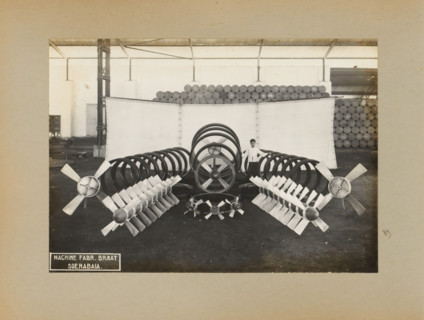 Fans, album page, photograph, Album page with a photo of a display of fans. Part of a photo album