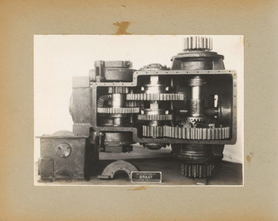 Machine, album page, photograph, Album page with a photo of a machine with gears. Part of a photo