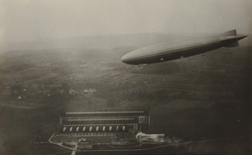 The Amerika-zeppelin ZR 3 at a hangar in Friedrichshafen, photograph, A zeppelin in the sky with a
