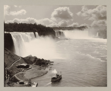 Niagara Falls, United States, Canada, photograph, a boat is sailing in the middle at the bottom.,