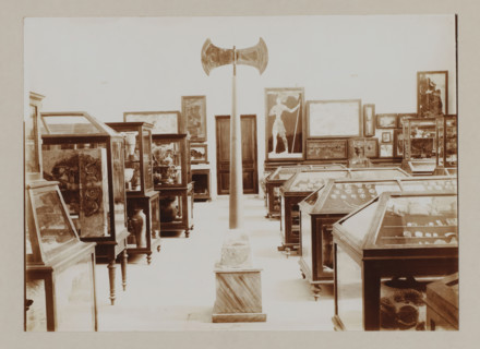 Double axe in museum on Crete, photograph, Double axe, symbol of divinity, amidst cabinets with