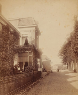 Street scene, with man, woman, and two children in front of a house (former title), Johannes