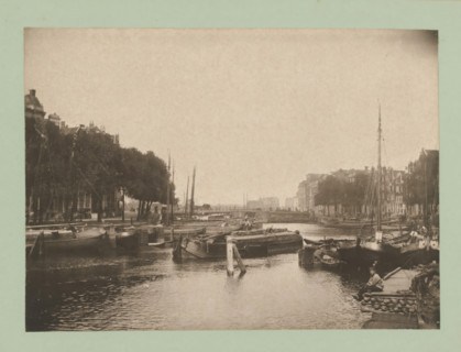 View of Amsterdam, album page, photomechanical print, This print is part of an album., inscription: