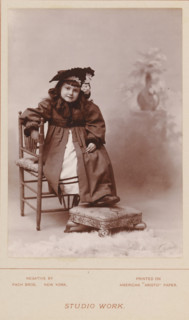 Portrait of an unknown girl on a chair, Studio work, photograph, page, inscription: 'printed on