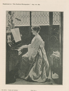Woman playing piano, page, photomechanical print, inscription: 'See Article: 'Posing and Lighting