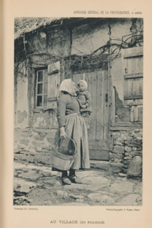 Woman with a child in her arm in a village in Picardy, France, Au Village (En Picardie), page,
