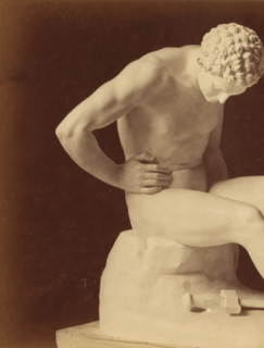 Sculpture of a man and a sword by Leopold Borbone, photograph, This photograph is part of a cover