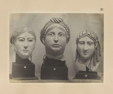 Three fragments of Egyptian sculptures, female heads, photograph, page, number: 'XI', c. 1890 - c.