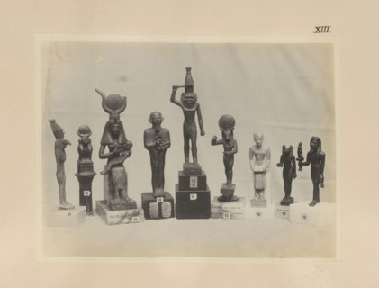 Nine Egyptian objects, including bronze sculptures of Mut, Anupt, Isis with Horis and Apis,