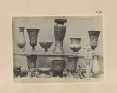 Sixteen Egyptian objects, vases, a sculpture of Bes and a sistrum, photograph, page, number: