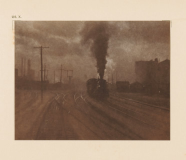 Railway lines with steam train, page, photomechanical print, inscription: 'The hand of man by