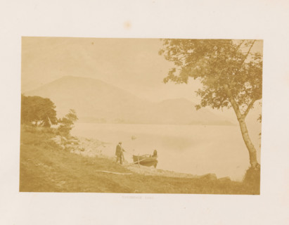 View of Ennerdale Water in the Lake District with a rowboat at the shore, Ennerdale Lake,