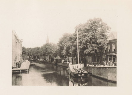 View of a canal in Delft, page, photomechanical print, title: 'Near the Arsenal, Delft.',
