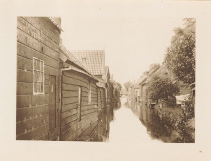 Houses along a ditch in Zaandam, page, photomechanical print, title: 'Afternoon in Zaandam.',