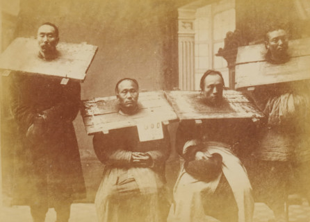 Portrait of four unknown Chinese men with a cangue around their necks, The cangue, photograph,