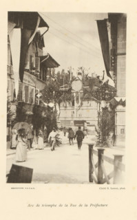 Arc de triomphe de la Rue de la Préfecture, View of a street with an arch of honor in Fribourg,