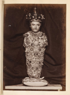 Wax figure of a baby with a crown and decorated with gemstones, photograph, page, c. 1850 - in or