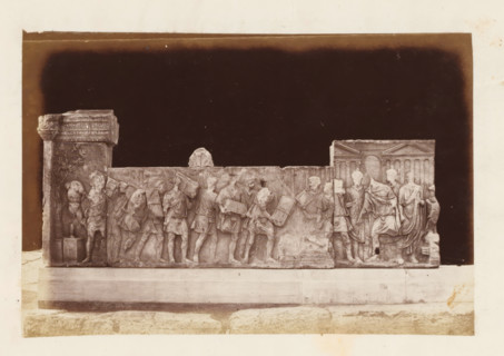Relief on the Roman Forum in Rome, depicting Emperor Trajan destroying the tax documents,