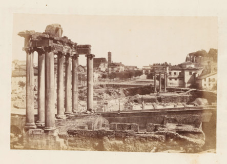 View of the Roman Forum in Rome, with the ruins of the Temple of Saturn in the foreground,