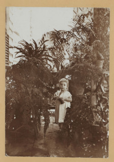 Portrait of Rose Charlotte van Lelyveld between plants, photograph, photographer: attributed to