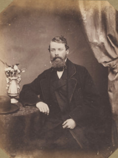 Portrait of an unknown man, standing with a stick in his hand, photograph, photographer: attributed