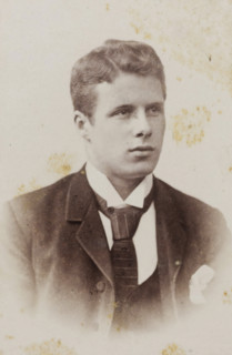 Portrait of a young man, album page, photograph, carte-de-visite, This photo is part of an album.,
