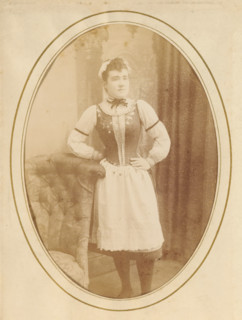 Portrait of a woman, album page, photograph, cabinet photograph, This photo is part of an album.,