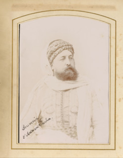 Portrait of a man, album page, photograph, cabinet photograph, This photo is part of an album.,