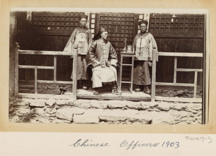 Chinese officers in front of a house in Tibet, photograph, Part of Photo album with 24 photos of