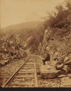 View of the Luleå - Narvik railway line, on the right an unknown man along the track, Norway, Lulea