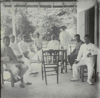 Manoekwari, Seven men and a child on a veranda in Manokwari, West Papua, stereograph, Manokwari,