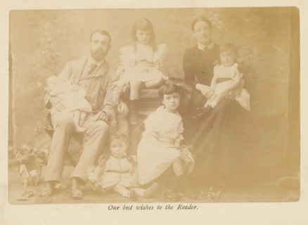 Group portrait of the family of Samuel Simmins, photograph, page, inscription: 'Our best wishes to