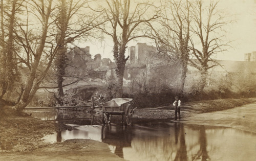 View of Kenilworth Castle, with a man with a handcart in the foreground, Kenilworth Castle, from
